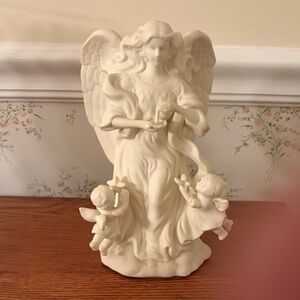 PartyLite bisque porcelain “Angel of Light” candle holder.